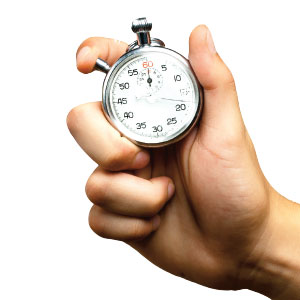 hands holding a stopwatch