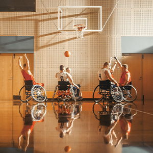 Image of basketball players competing in wheelchairs